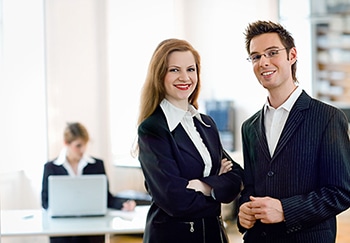 Male And Female Dressed In Business Attire