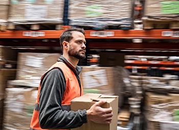 A Temp Job Worker Carrying Box in Warehouse