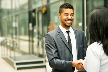 Candidate with Less Experience Shaking Hands with a lady interviewer