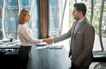 Handshake Between a Candidate and a Hiring Agency Representative